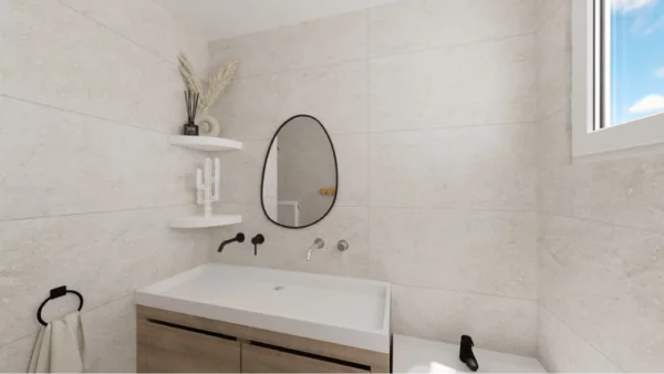 cactus porte bijoux blanc troué dans une salle de bain