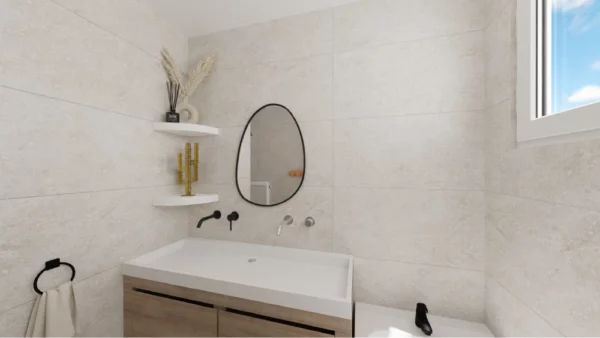 cactus porte bijoux doré troué dans une salle de bain