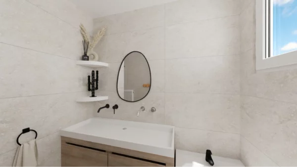 cactus porte bijoux noir troué dans une salle de bain