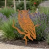 Hiboux-corten-exterieur Silhouette de hiboux en acier corten dans un jardin – Normandy Steel